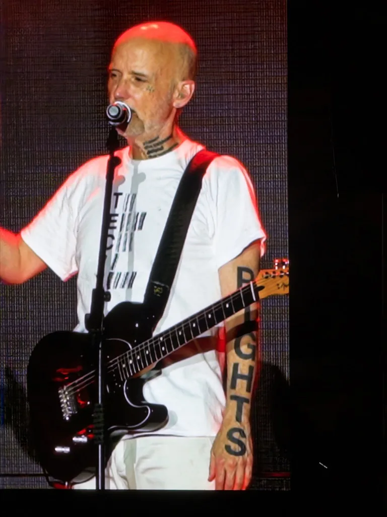 ANIMAL RIGHTS - the tattoos down his forearm